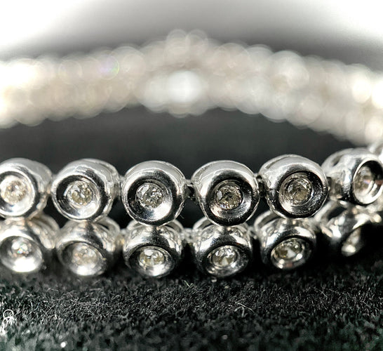 Bracelet Bracelet rivière or blanc double orné de 80 brillants de 0,03 carat chacun 58 Facettes