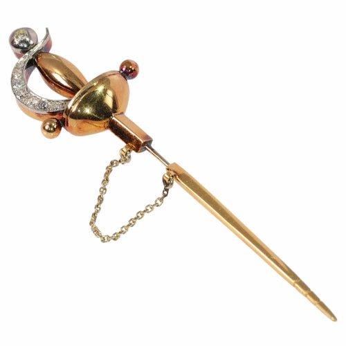 Broche Une broche épée vintage ornée de diamants : une traversée du temps et de la mode 58 Facettes 24246-0390