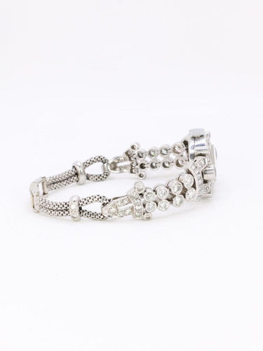 Montre Montre Art Deco or blanc platine diamants 58 Facettes 1088.1
