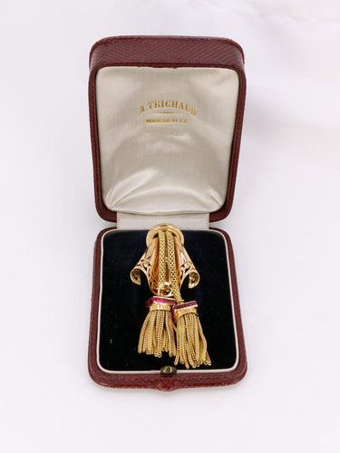 Broche Broche passementerie or jaune rubis calibrés 58 Facettes 1159.3