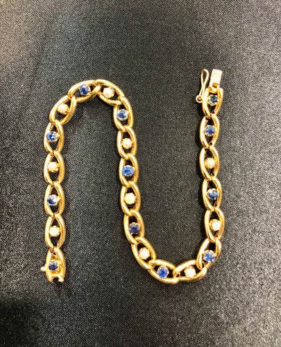 Bracelet Bracelet ancien circa 1900, perles et saphirs, or jaune 58 Facettes