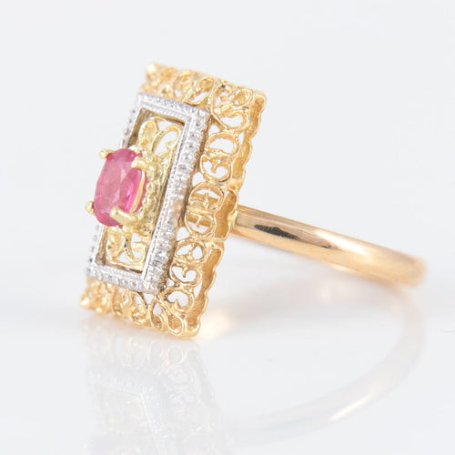 Bague 50 Bague or jaune, rubis, motifs "arabesques" 58 Facettes