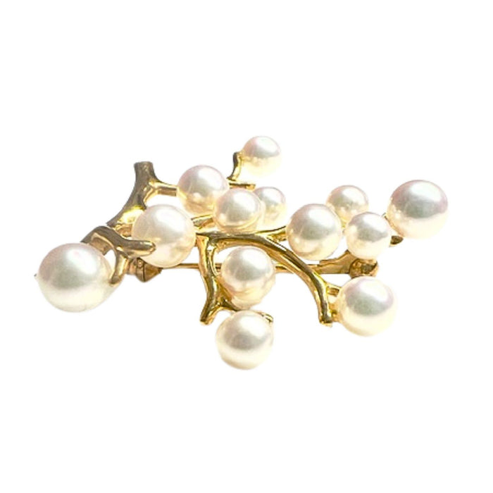 Broche en or avec perles