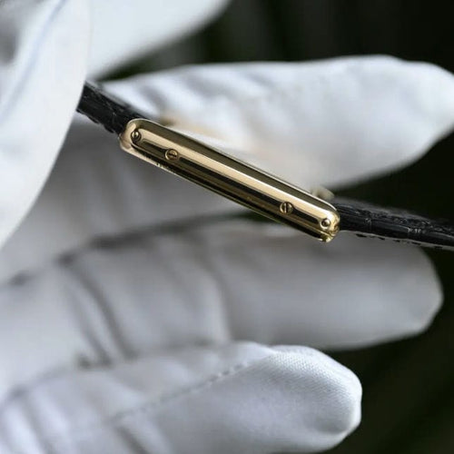 Montre Cartier Tank 18 carats MM 58 Facettes