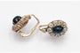 Boucles d'oreilles en or avec diamants et saphirs taille cabochon.
