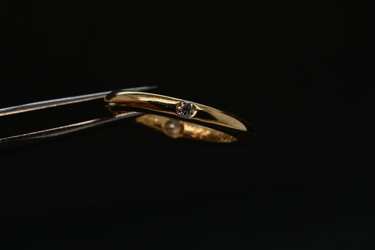 Bague 47 Solitaire rond en or serti d'un diamant taille brillant 58 Facettes