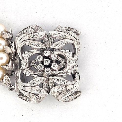 Bracelet de perles avec fermoir en or blanc 18 carats et diamants