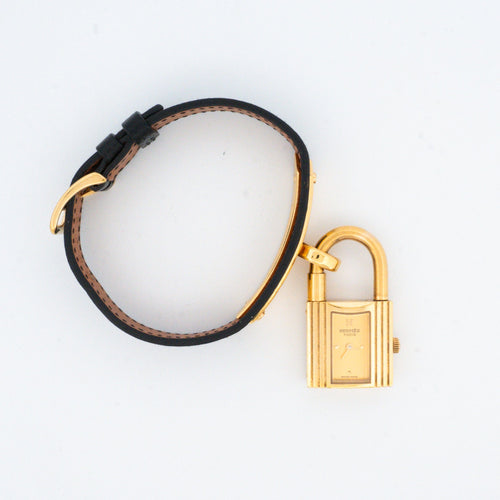 Montre Hermès - Montre Kelly en acier doré et cadran champagne 58 Facettes