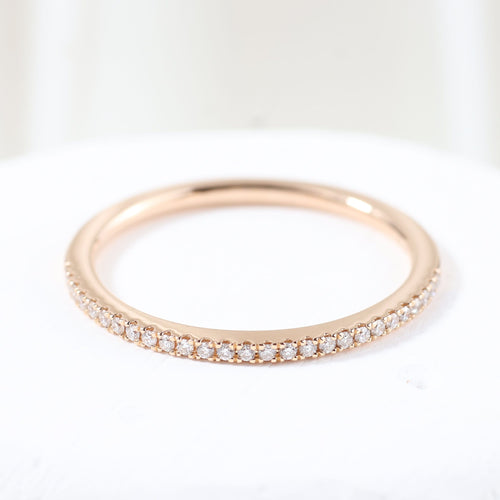 Bague 54 Bague en or rose sertie de diamants taille brillant en canal 58 Facettes J0100324