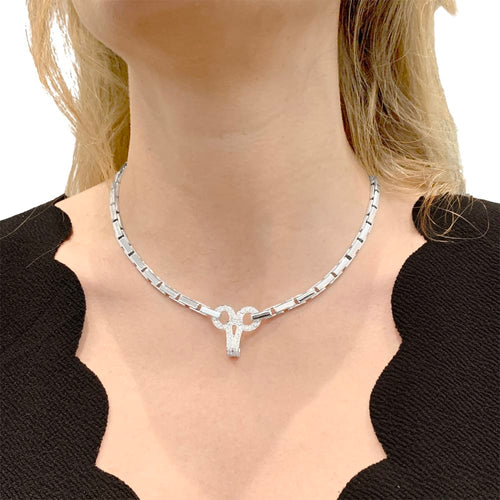 Collier Collier Cartier "Agrafe" en or blanc et diamants. 58 Facettes 35235