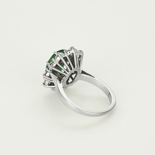 Bague 50 Bague marguerite en or blanc, émeraude et diamants 58 Facettes B250523