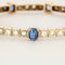 Bracelet jonc ouvrant en or jaune et argent, diamants et saphirs 58 Facettes 230460