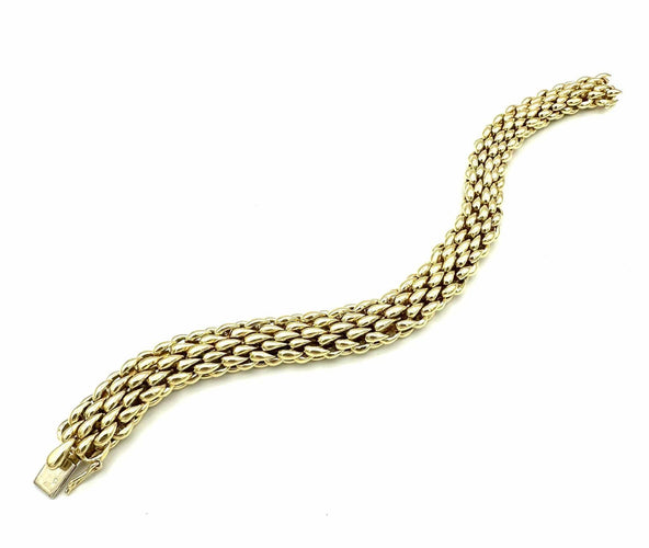 Bracelet CHAUMET. Bracelet vintage or jaune 18K 58 Facettes