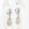 Boucles d'oreilles Boucles d'oreilles vintage ajourées en or blanc 18 carats serties de diamants 58 Facettes 135023B