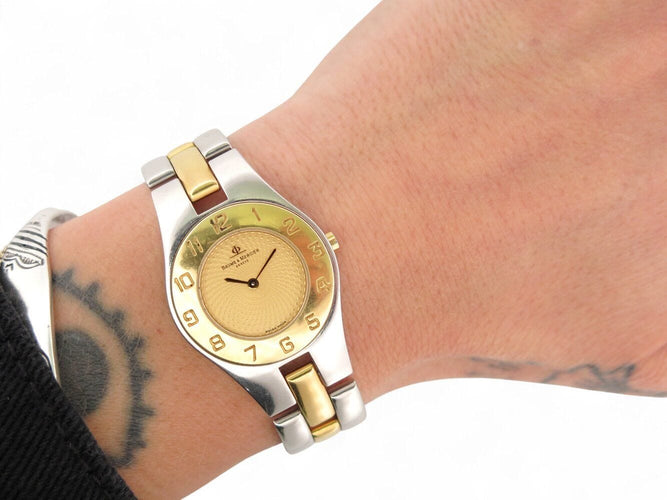 Montre montre BAUME ET MERCIER linea mvc45183 27mm or et acier quartz lady 58 Facettes 269933