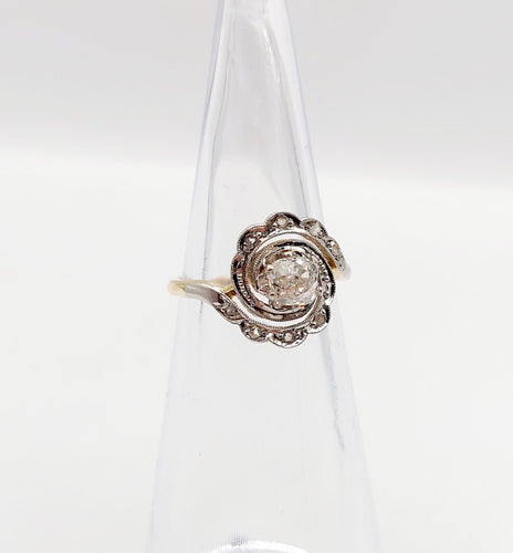 Bague 43 Bague tourbillon antique en or 18k et platine, diamant ancien 0,30 ct et roses 58 Facettes A06352