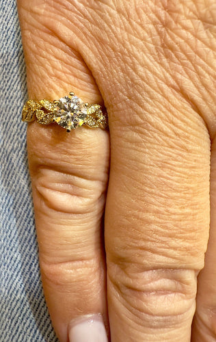 Bague 47 Solitaire en or jaune et diamants, feuilles de 58 Facettes