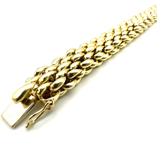 Bracelet CHAUMET. Bracelet vintage or jaune 18K 58 Facettes