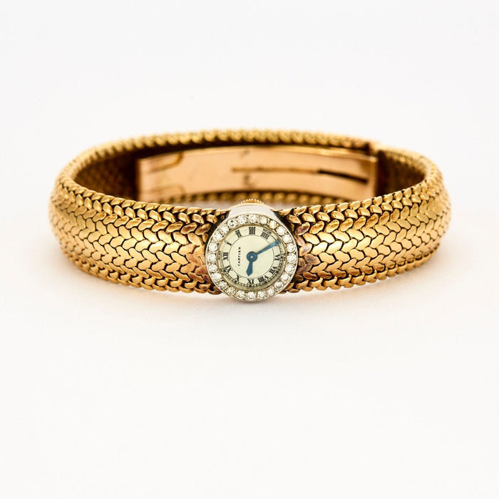 Bracelet CARTIER – VINTAGE – Bracelet montre de dame en or jaune et or blanc 58 Facettes