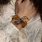 Bracelet Bracelet en or jaune et platine avec Diamants vers 1950. 58 Facettes