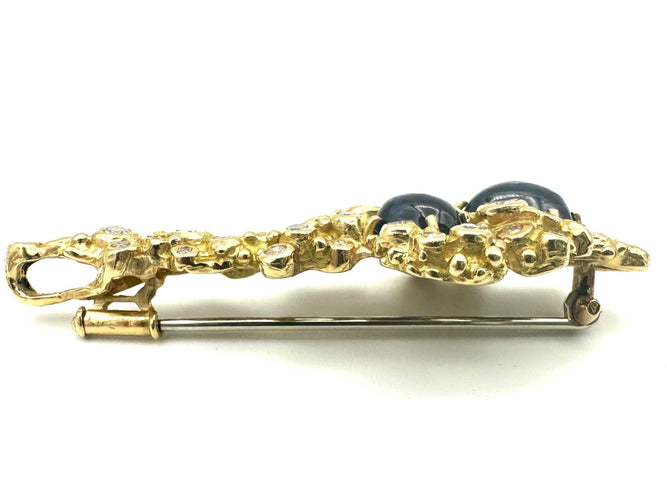GILBERT ALBERT. Pendentif/broche or jaune, saphirs et diamants