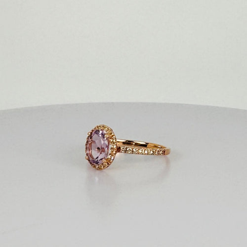 Bague Bague en or rose avec améthyste ovale 1,28 ct et saphirs blancs 58 Facettes 2508010