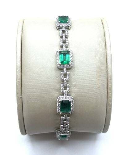 Bracelet Bracelet rivière en or gris, émeraudes et diamants 58 Facettes