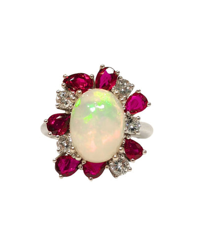 Bague 55 Bague avec Opale entourée de Rubis et Diamants 58 Facettes