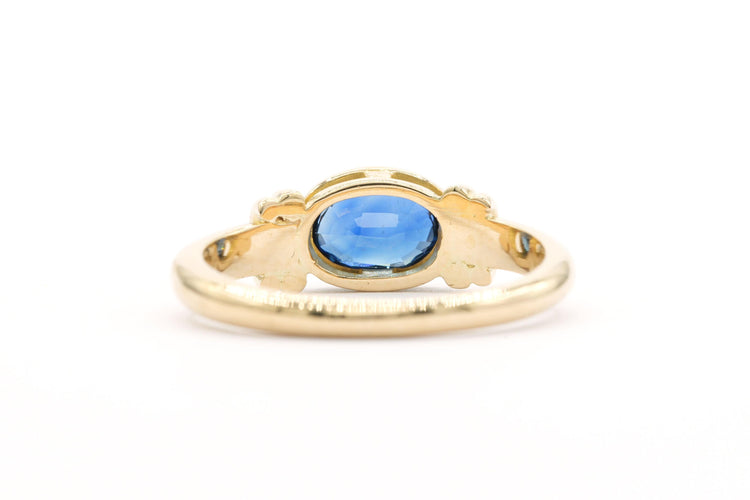 Bague 52 Bague contemporaine en or jaune sertie d'un saphir 58 Facettes 21648