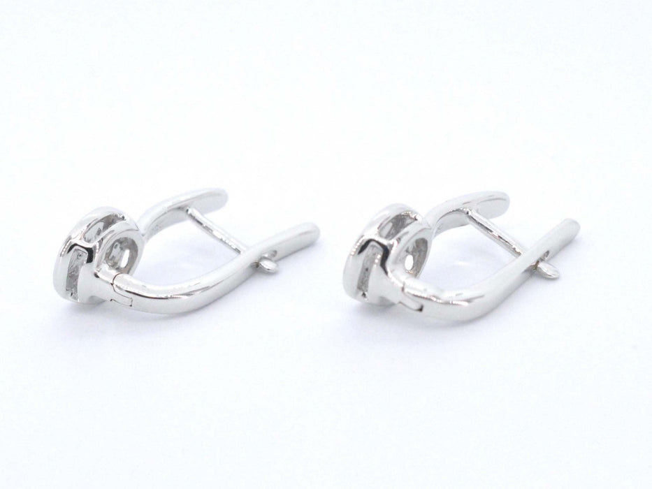 Boucles d'oreilles en or blanc avec diamants