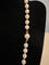 Collier Collier choker 55 perles de culture fermoir or jaune dans une perle 58 Facettes