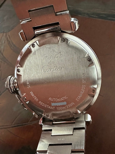 CARTIER - Montre Pasha cadran noir, mouvement automatique