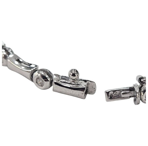 Bracelet Bracelet design contemporain en or avec diamants 58 Facettes Q263B(99)