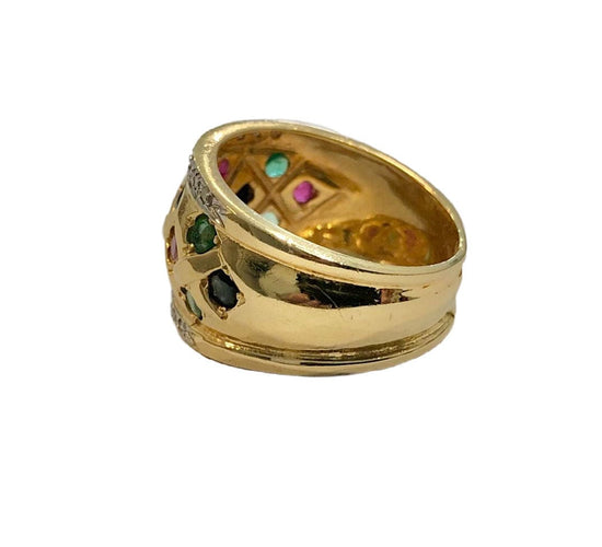 Bague 52 Bague or jaune, saphirs, rubis, émeraude, diamants 58 Facettes