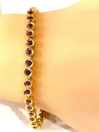 Bracelet Bracelet ligne en or jaune et rubis 58 Facettes AB609