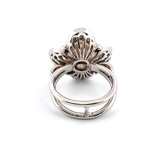 Bague 52 Bague en or blanc avec perle et diamants 58 Facettes