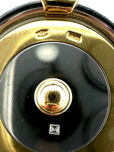 Pendentif BVLGARI. Pendentif vintage or et acier 58 Facettes