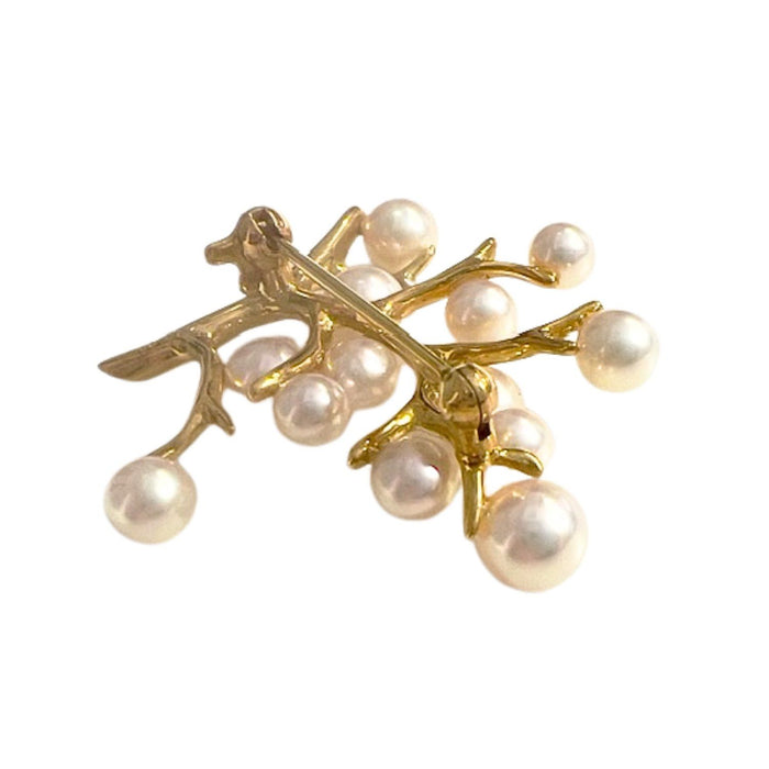 Broche en or avec perles