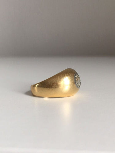 Bague bombée en or jaune 18K et diamant