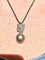 Pendentif Pendentif en or blanc, perle de Tahiti et diamants 58 Facettes AB606