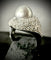 Bague 53.5 bague en or blanc sertie d'une perle grise et 1,95 carats de diamants 58 Facettes