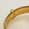 Bracelet Bracelet jonc en or jaune à motif de fleurs 58 Facettes NAR0688