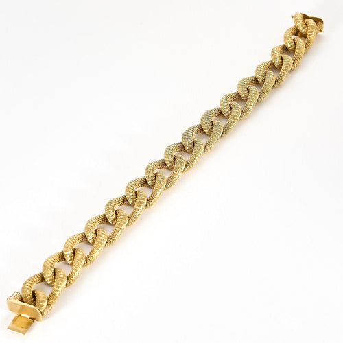 Bracelet en or jaune à maille gourmette tissée