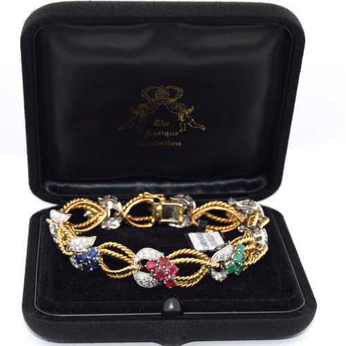 Bracelet Bracelet en or jaune orné de diamants et de pierres de couleur 58 Facettes