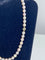 Collier Collier choker perles de culture blanches 46 cm fermoir or 58 Facettes