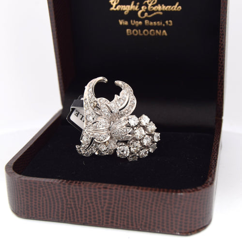 Broche Broche ancienne en or blanc 18 carats 58 Facettes