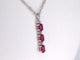 Pendentif Pendentif en or blanc avec diamants et rubis 58 Facettes 2138