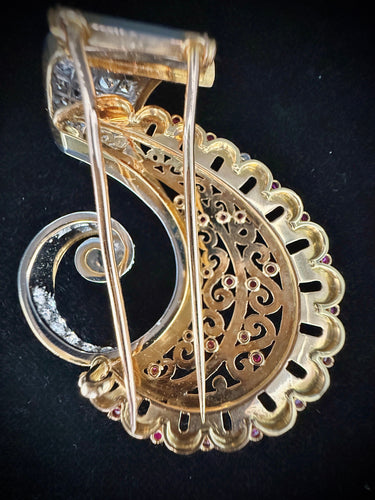 Broche Broche sertie de diamants et rubis en cabochon en or jaune et blanc 58 Facettes