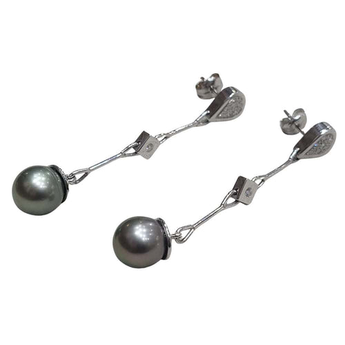 Boucles d'oreilles Boucles d'oreilles en or blanc 18 carats, perles et diamants taille brillant 58 Facettes T158