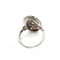 Bague 52 Bague en platine avec diamant central et diamants environnants 58 Facettes